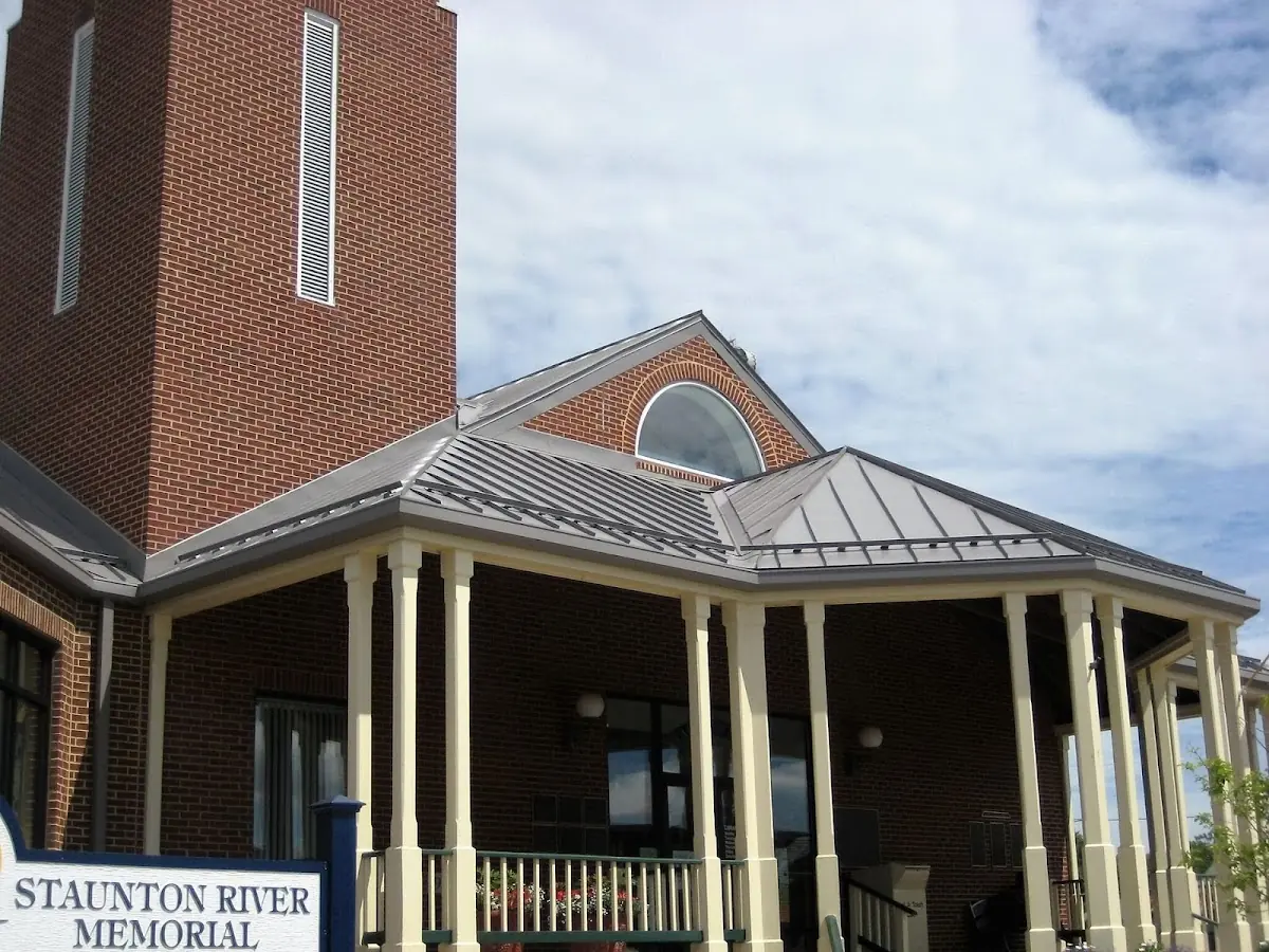 Skilled roofing craftsmen working on a residential roof in Glenn Springs